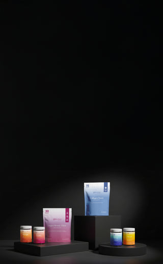 Mobile-Glotrition Black Friday product display featuring Super Beauty Elixir, Collagen Boost, HairRx, Afterglo, Sleep, and Mood supplements arranged on black pedestals.