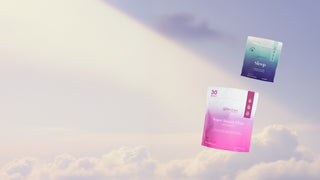 Sleep supplement packages floating above clouds with a gradient sky background