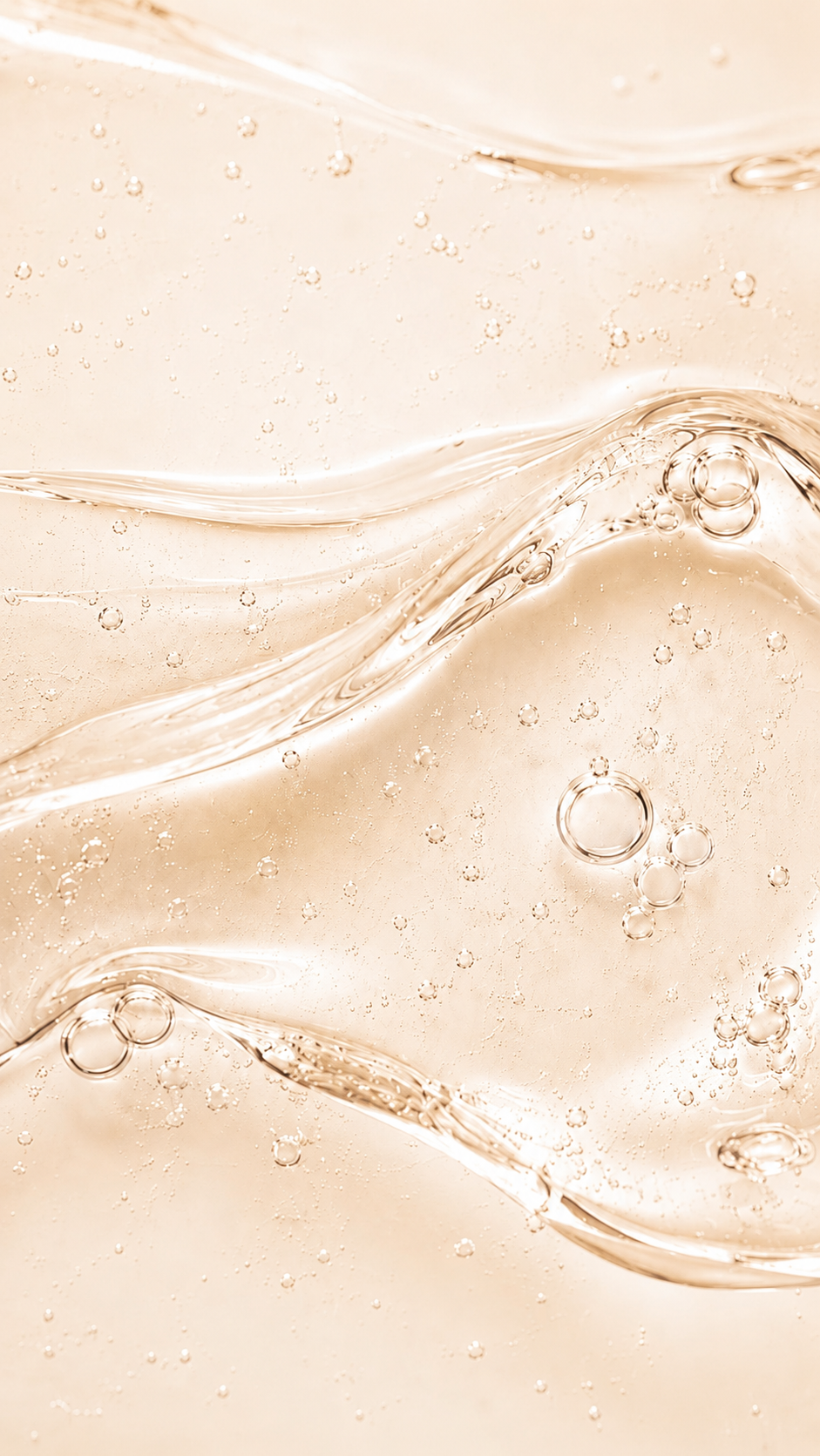 Close-up of beige liquid with bubbles